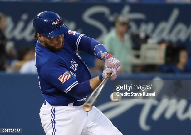 Toronto Blue Jays catcher Russell Martin gets a single late in the game as the Toronto Blue Jays fall to the New York Mets 6-3 at the Rogers Centre...
