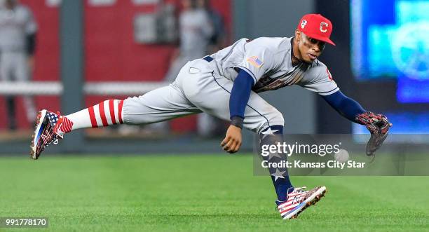 Cleveland Indians shortstop Francisco Lindor makes the stop on a single by the Kansas City Royals' Salvador Perez in the eighth inning on Wednesday,...
