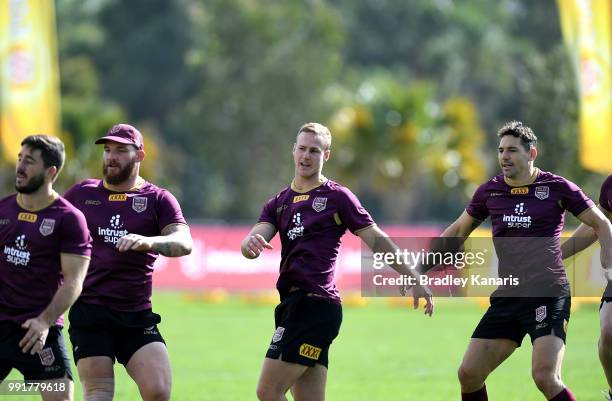 Daly Cherry-Evans and team mates warm-up during a Queensland Maroons State of Origin training session at Sanctuary Cove on July 5, 2018 in Gold...