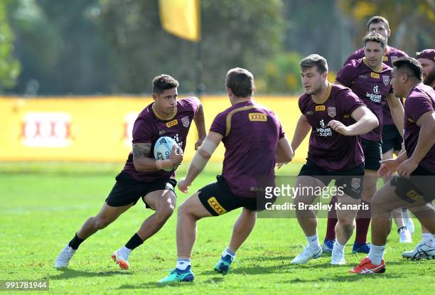 Dan Gagai takes on the defence during a Queensland Maroons State of Origin training session at Sanctuary Cove on July 5, 2018 in Gold Coast,...