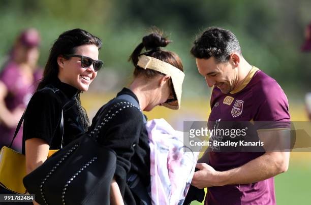 Billy Slater is seen with his wife Nicole Slater and friends during a Queensland Maroons State of Origin training session at Sanctuary Cove on July...