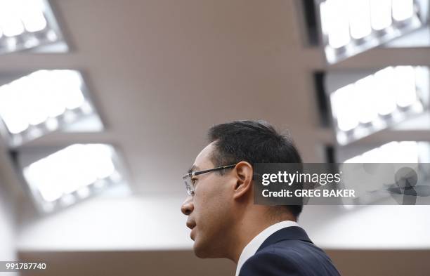 Chinese Ministry of Commerce spokesman Gao Feng speaks at a press conference in Beijing, days ahead of an imminent US-China trade war, on July 5,...