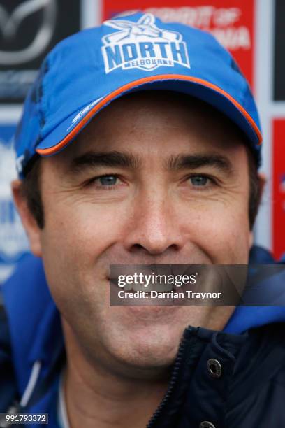 Brad Scott, Senior Coach of the Kangaroos speaksd to the media before a North Melbourne Kangaroos AFL training session at Arden Street Ground on July...