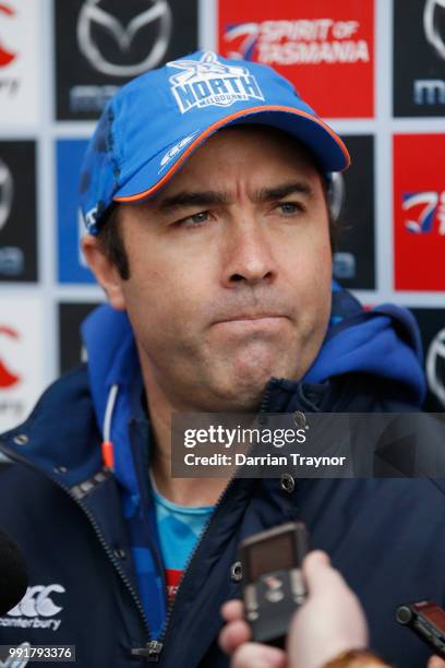 Brad Scott, Senior Coach of the Kangaroos speaksd to the media before a North Melbourne Kangaroos AFL training session at Arden Street Ground on July...