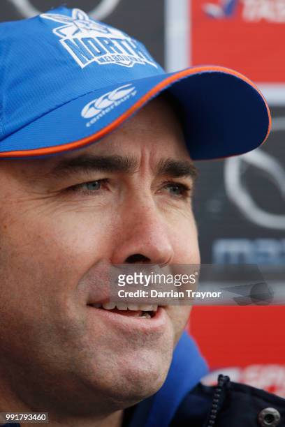 Brad Scott, Senior Coach of the Kangaroos speaksd to the media before a North Melbourne Kangaroos AFL training session at Arden Street Ground on July...