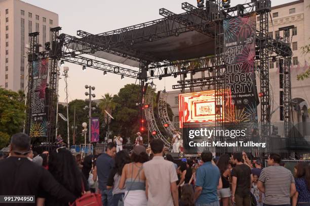 Music group Quitapenas performs at 6th annual Grand Park + the Music Center's 4th of July Block Party at Los Angeles Grand Park on July 4, 2018 in...