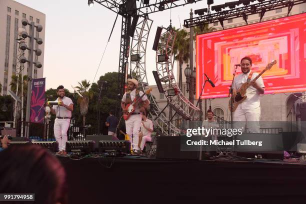 Music group Quitapenas performs at 6th annual Grand Park + the Music Center's 4th of July Block Party at Los Angeles Grand Park on July 4, 2018 in...