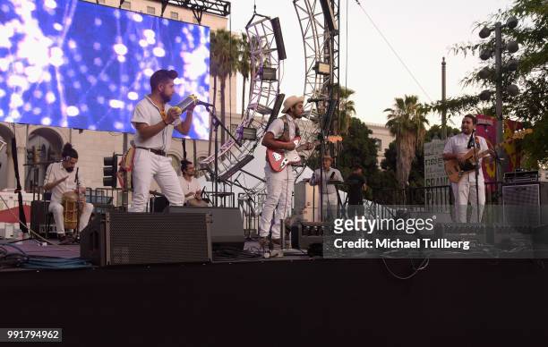 Music group Quitapenas performs at 6th annual Grand Park + the Music Center's 4th of July Block Party at Los Angeles Grand Park on July 4, 2018 in...