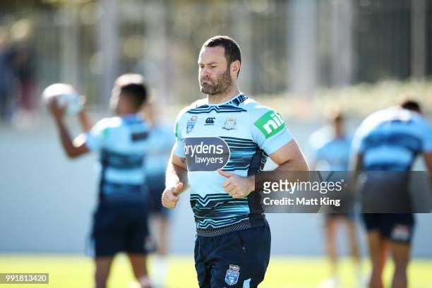 Boyd Cordner looks on during a New South Wales Blues State of Origin training session at NSWRL Centre of Excellence Field on July 5, 2018 in Sydney,...