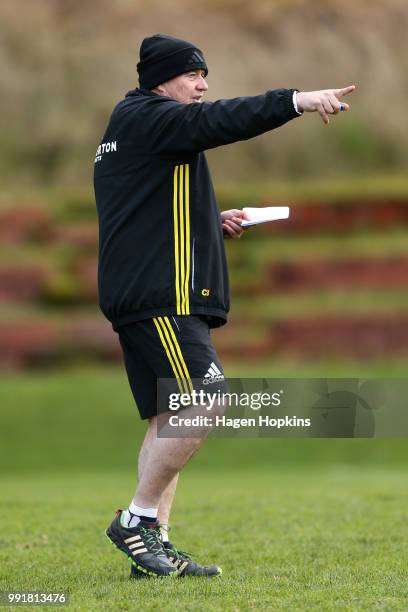 Coach Chris Boyd talks to his players during a Hurricanes Super Rugby training session at Rugby League Park on July 5, 2018 in Wellington, New...