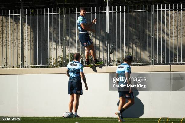 Nathan Cleary retrieves a ball during a New South Wales Blues State of Origin training session at NSWRL Centre of Excellence Field on July 5, 2018 in...