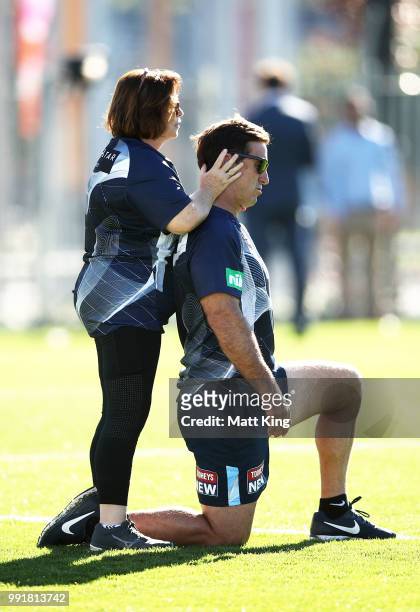 Andrew Johns receives a head massage during a New South Wales Blues State of Origin training session at NSWRL Centre of Excellence Field on July 5,...
