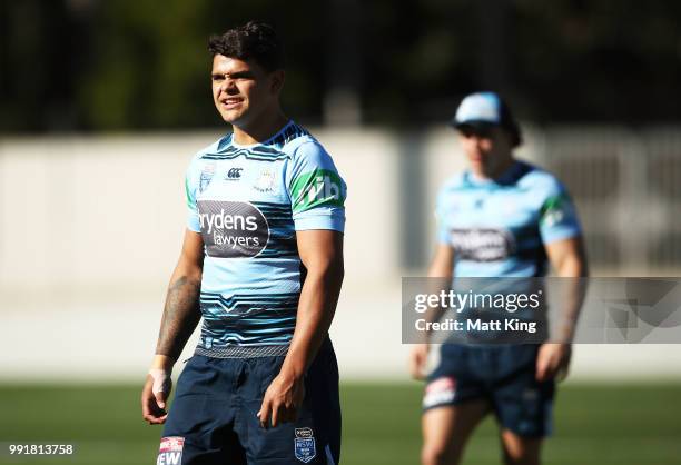 Latrell Mitchell looks on during a New South Wales Blues State of Origin training session at NSWRL Centre of Excellence Field on July 5, 2018 in...