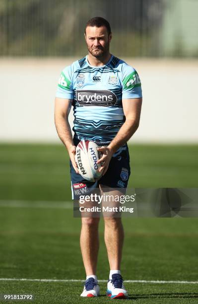 Boyd Cordner looks on during a New South Wales Blues State of Origin training session at NSWRL Centre of Excellence Field on July 5, 2018 in Sydney,...