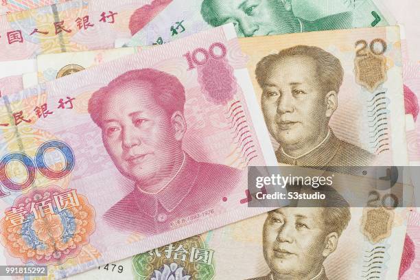 Banknotes of Renminbi arranged for photography on July 03 2018 in Hong Kong, Hong Kong. The Chinese yuan has been slumping for the past eight days...