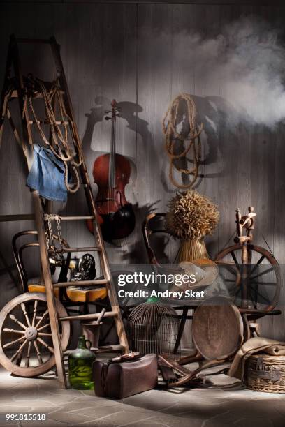 still life with old cello - copper still stockfoto's en -beelden