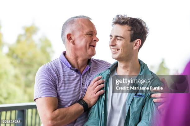 two men in conversation - androgynous boys stock pictures, royalty-free photos & images