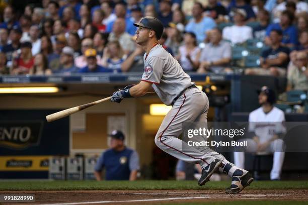 Joe Mauer of the Minnesota Twins hits a double in the third inning against the Milwaukee Brewers at Miller Park on July 2, 2018 in Milwaukee,...