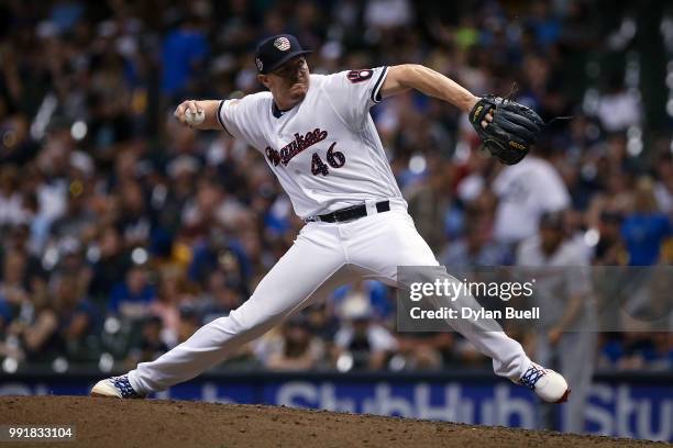Corey Knebel of the Milwaukee Brewers pitches in the tenth inning against the Minnesota Twins at Miller Park on July 2, 2018 in Milwaukee, Wisconsin.