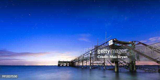 totland bay pier - totland bay stock pictures, royalty-free photos & images