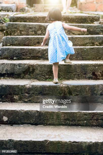 little chinese girl - girl rising stock pictures, royalty-free photos & images