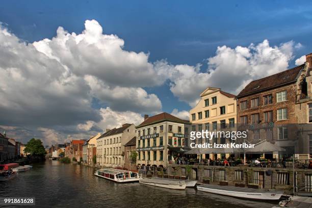 view of ghent on a fair day, flanders, belgium - 東フランダース ストックフォトと画像