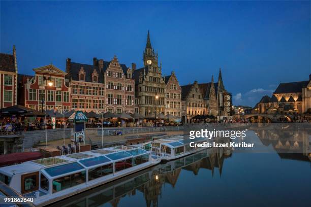 view of ghent, the flemish city of belgium and its historical buidings at the blue hour - east flanders stock pictures, royalty-free photos & images
