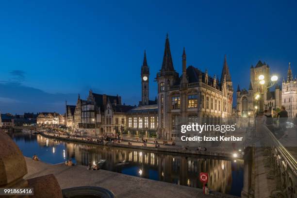 view of ghent,the flemish city of belgium and its historical buidings at the blue hour, flanders - 東フランダース ストックフォトと画像