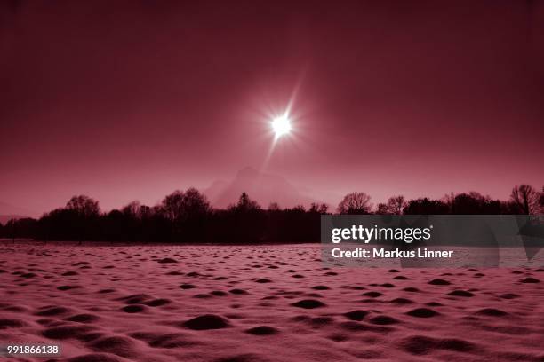 sun over untersberg - molehill stock pictures, royalty-free photos & images