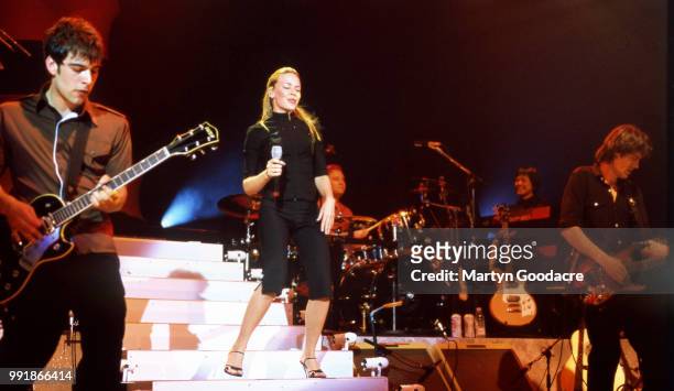 Australian-British singer and actress Kylie Minogue performs on stage at Shepherd's Bush Empire, London, 1998.