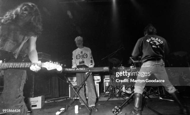 English singer, songwriter, composer, multi-instrumentalist and record producer Peter Hook performs on stage with Revenge, United Kingdom, 1990.