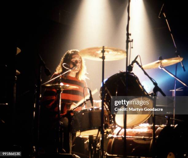 Drummer Brendan O'Hare of Teenage Fanclub performs on stage, United Kingdom, 1991.