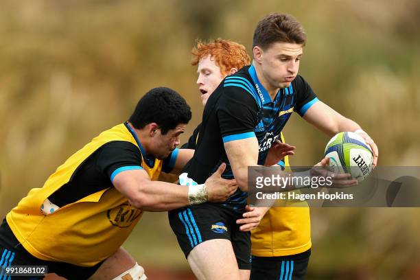 Beauden Barrett is tackled during a Hurricanes Super Rugby training session at Rugby League Park on July 5, 2018 in Wellington, New Zealand.