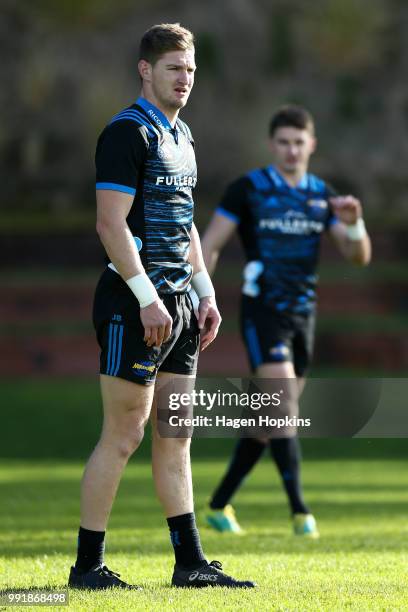 Jordie Barrett and Beauden Barrett look on during a Hurricanes Super Rugby training session at Rugby League Park on July 5, 2018 in Wellington, New...
