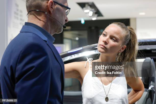 Klaus Bischoff and Sonja Gerhardt during the exhibition preview of 'Driving Vizzions to Reality' at DRIVE. Volkswagen Group Forum on July 4, 2018 in...