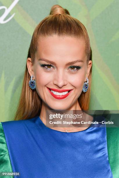 Model Petra Nemcova attends the amfAR Paris Dinner 2018 at The Peninsula Hotel on July 4, 2018 in Paris, France.