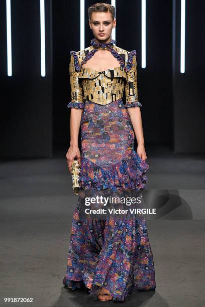 Model walks the runway during the Yumi Katsura Haute Couture Fall Winter 2018/2019 fashion show as part of Paris Fashion Week on July 2, 2018 in...