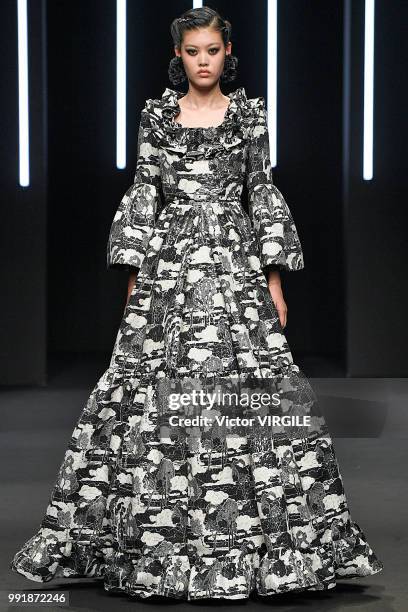 Model walks the runway during the Yumi Katsura Haute Couture Fall Winter 2018/2019 fashion show as part of Paris Fashion Week on July 2, 2018 in...