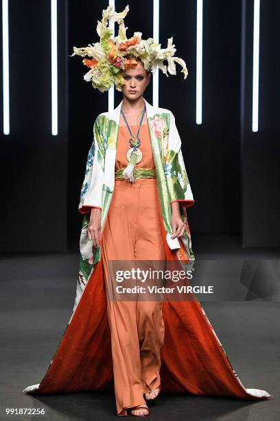 Model walks the runway during the Yumi Katsura Haute Couture Fall Winter 2018/2019 fashion show as part of Paris Fashion Week on July 2, 2018 in...