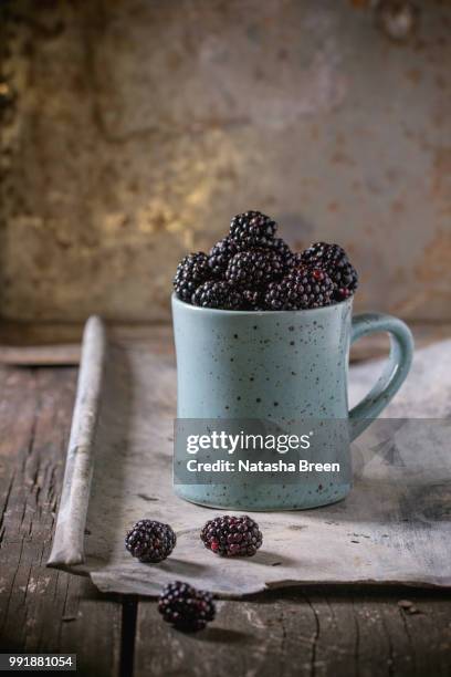 mug of dewberry - dewberry stock pictures, royalty-free photos & images