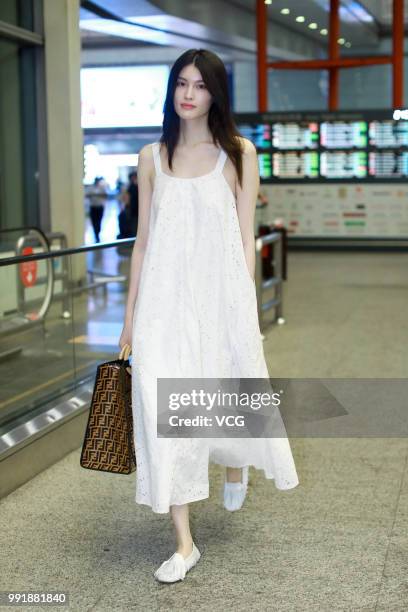 Fashion model Sui He is seen at Beijing Capital International Airport on July 2, 2018 in Beijing, China.