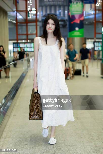 Fashion model Sui He is seen at Beijing Capital International Airport on July 2, 2018 in Beijing, China.
