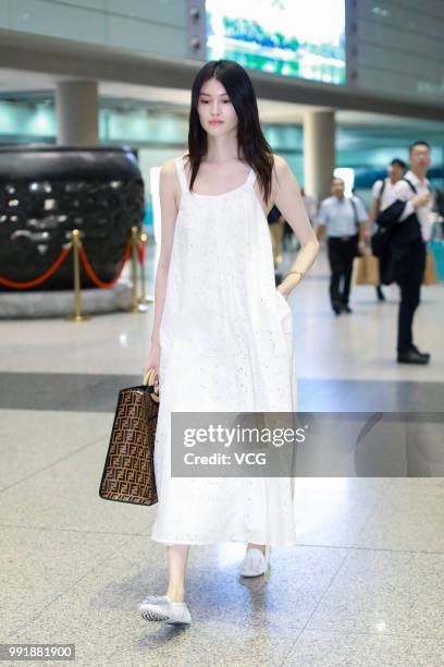 Fashion model Sui He is seen at Beijing Capital International Airport on July 2, 2018 in Beijing, China.