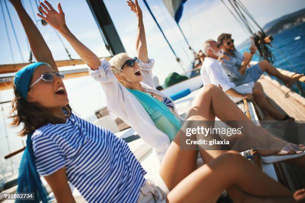 family on a sailing cruise. - gilaxia stock pictures, royalty-free photos & images