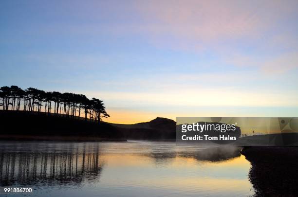 misty sunrise at budleigh - budleigh stock pictures, royalty-free photos & images