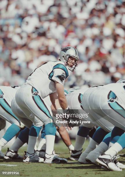 Steve Beuerlein, Quarterback for the Carolina Panthers calling the play with his offensive line during the National Football Conference West game...