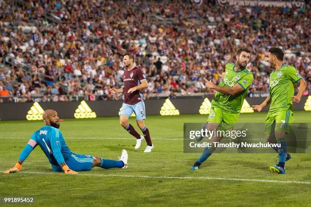 Will Bruin of Seattle Sounders, reacts after scoring past Tim Howard of Colorado Rapids at Dick's Sporting Goods Park on July 4, 2018 in Commerce...