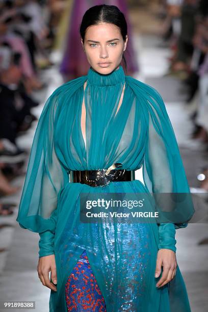 Adriana Lima walks the runway during the Schiaparelli Haute Couture Fall Winter 2018/2019 fashion show as part of Paris Fashion Week on July 2, 2018...