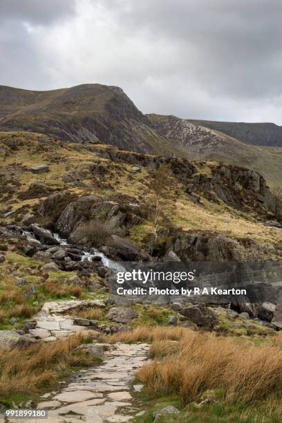 footbridge at cwm idwal, snowdonia national park, north wales - capel curig stock pictures, royalty-free photos & images