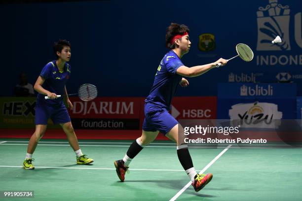 Du Yue and Li Yinhui of China compete against Hsu Ya Ching and Wu Ti Jung of Chinese Taipei during the Women's Doubles Round 2 match on day three of...